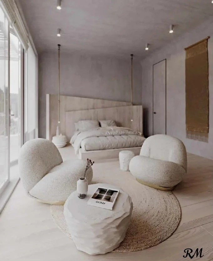 Soft Minimalism with Sculpted Lounge Chairs