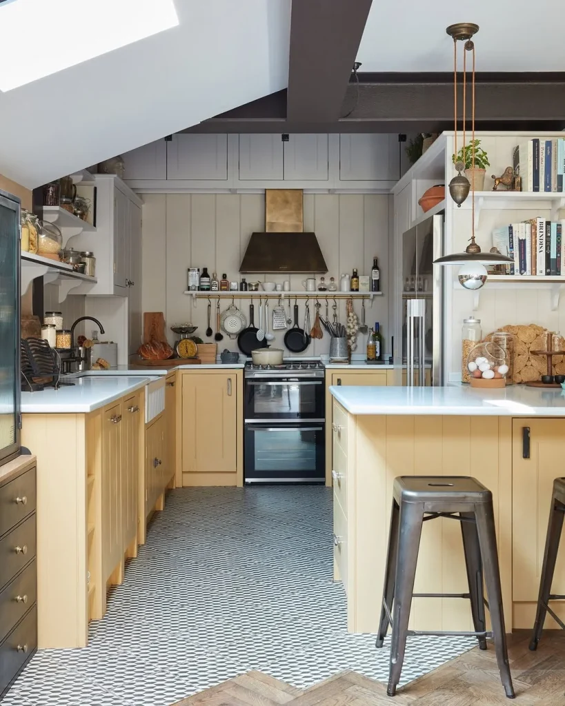 Industrial-Style Butter Yellow Kitchen with Patterned Flooring