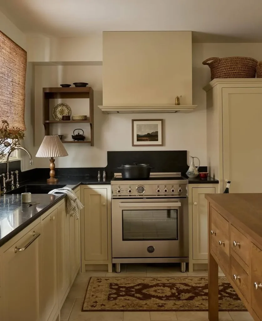Moody Butter Yellow Kitchen with Black Stone Countertops