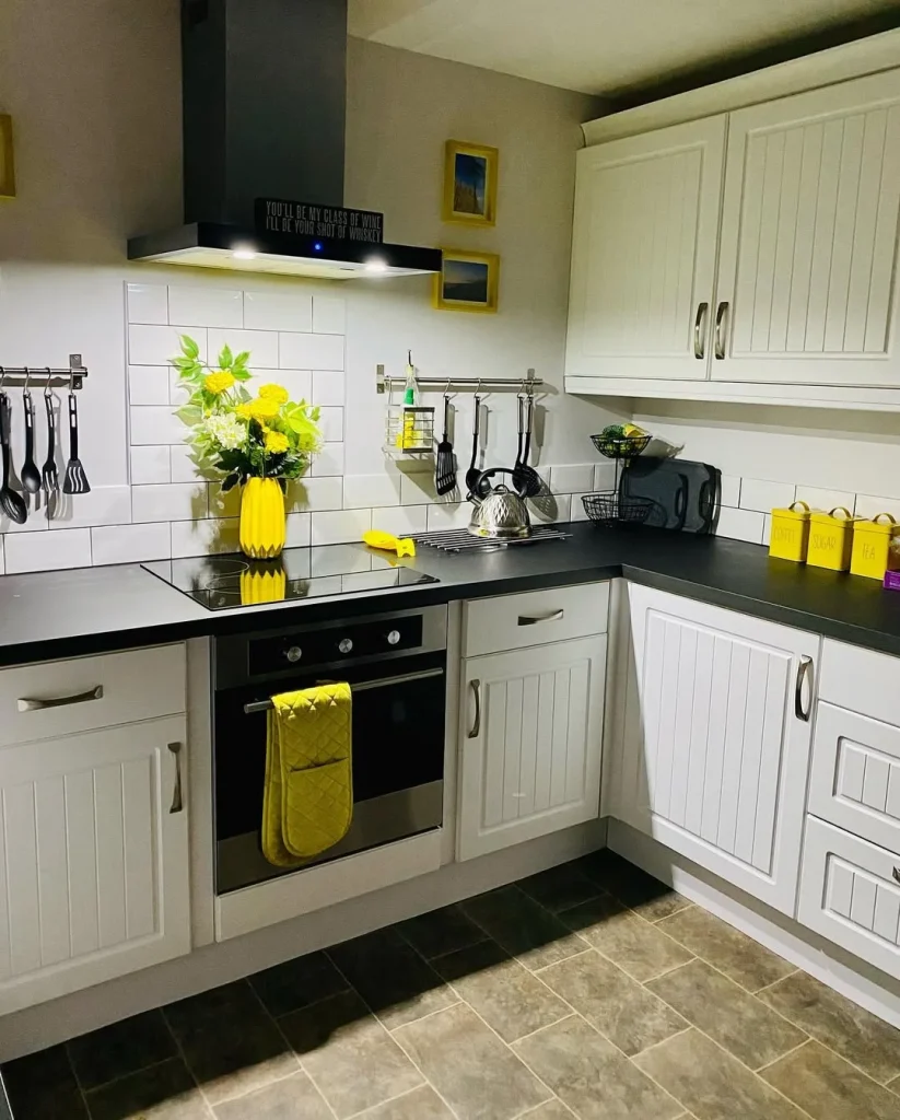 Two-Tone Butter Yellow and Black Kitchen Accents